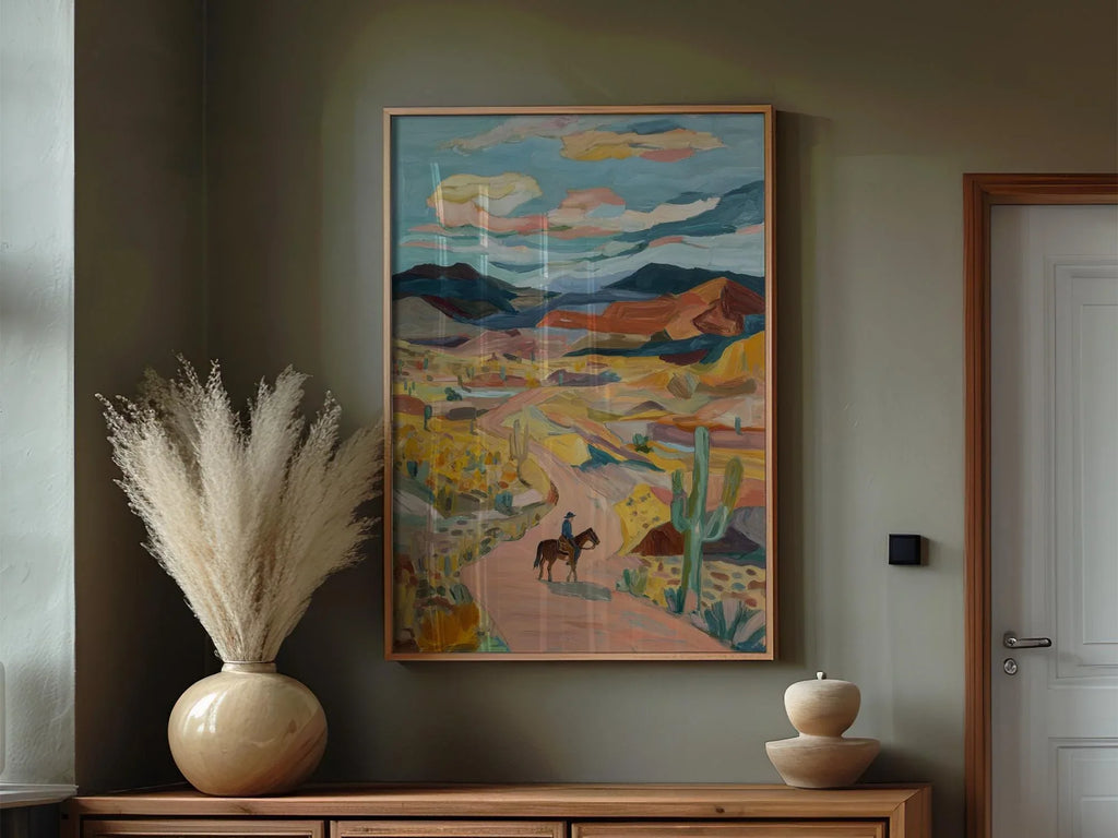 Desert cowboy wall art – lone horseback rider on Southwest trail with cacti and mountains