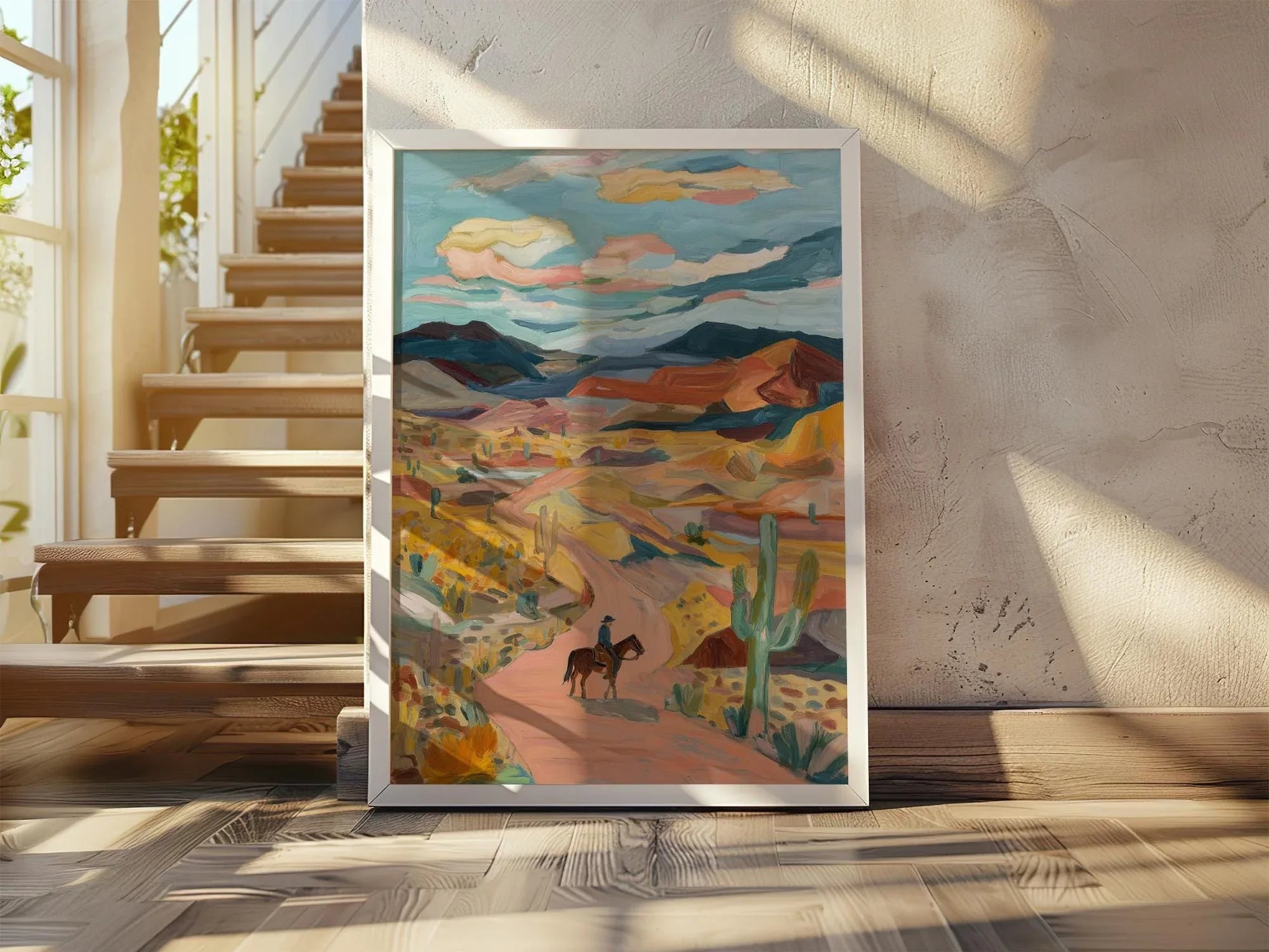 Desert cowboy wall art – lone horseback rider on Southwest trail with cacti and mountains