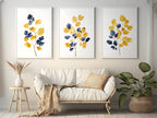 Mustard yellow and navy blue abstract leaf bouquet wall art set of 3 in modern wooden frame