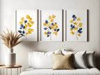 Mustard yellow and navy blue abstract leaf bouquet wall art set of 3 in modern wooden frame