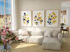 Mustard yellow and navy blue abstract leaf bouquet wall art set of 3 in modern wooden frame