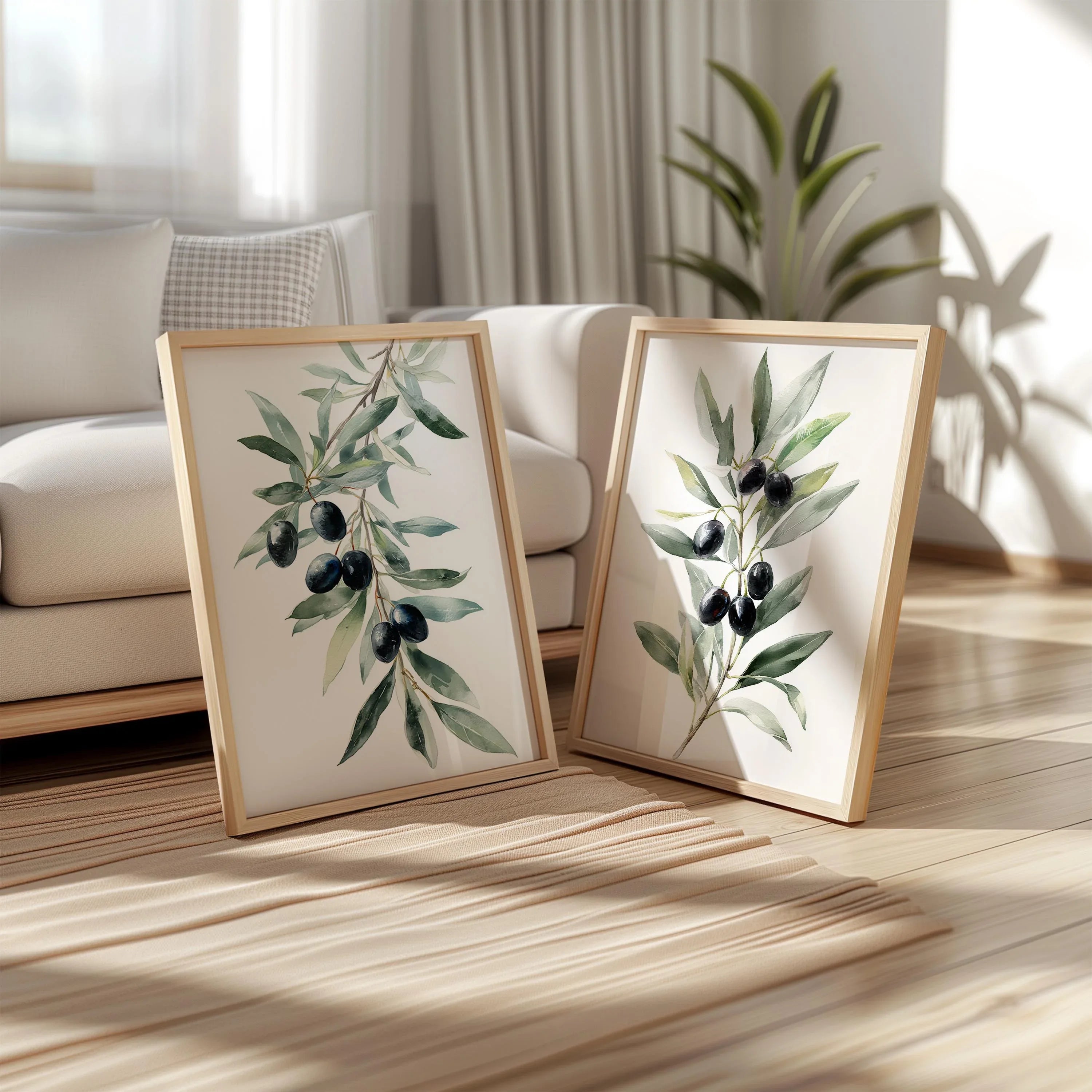 Olive branch botanical wall art set of 2 with green leaves and black olives on white background