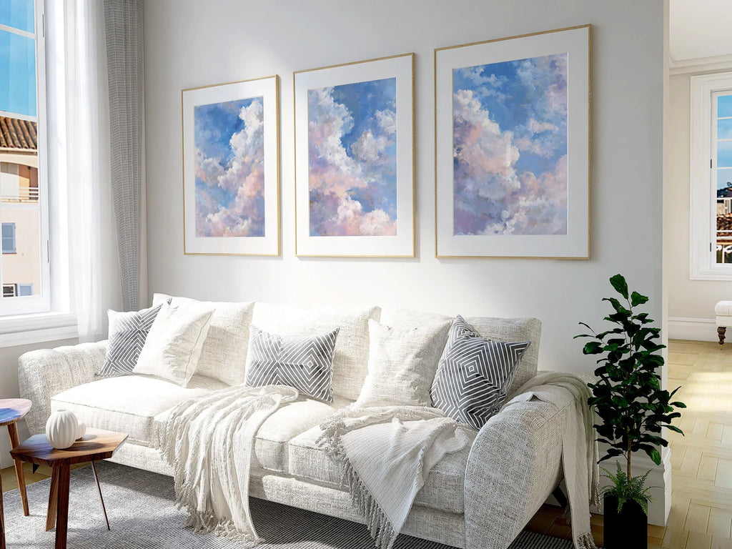 Pastel cloud triptych wall art set of 3 with dreamy blue sky and soft white clouds