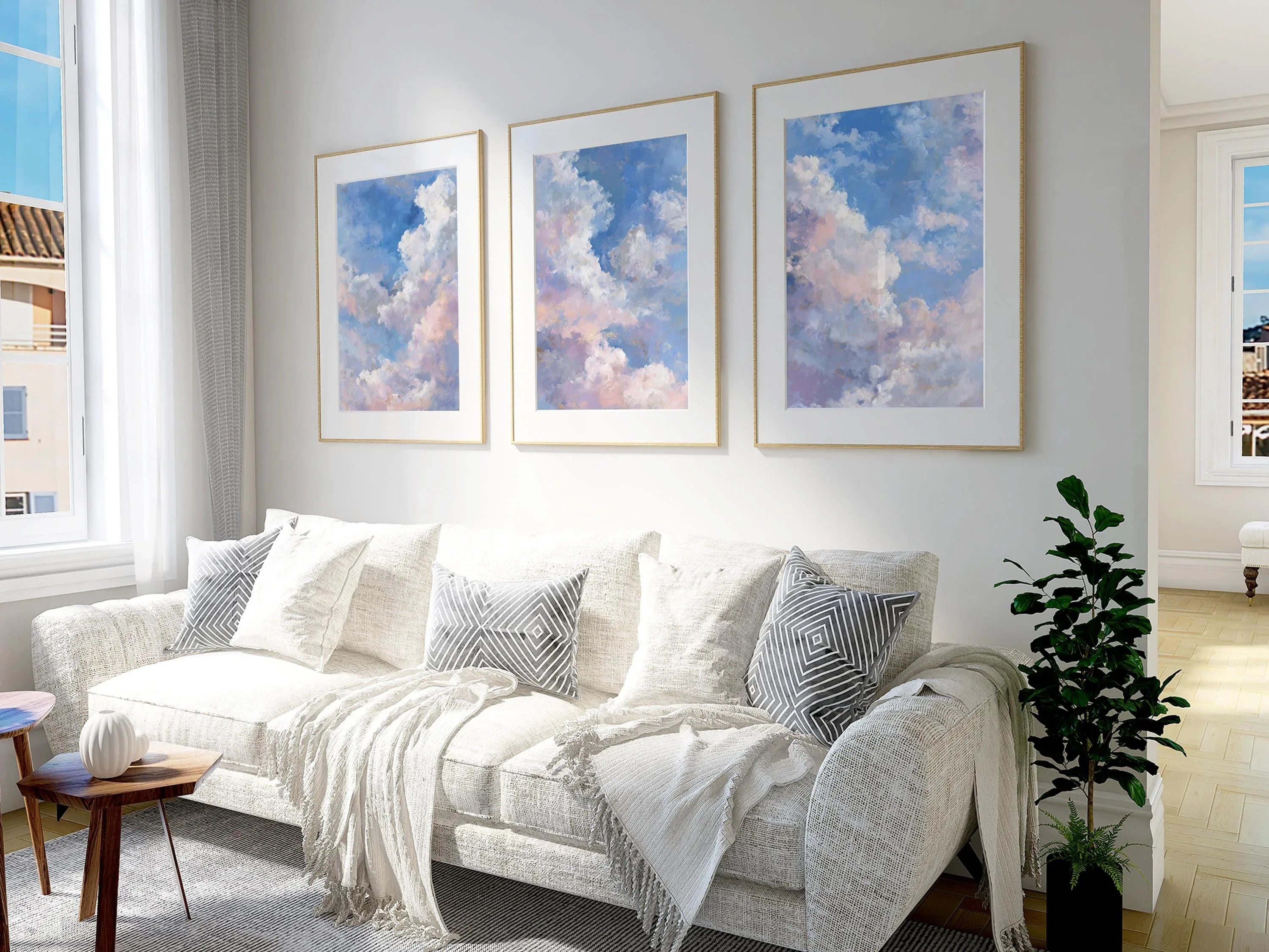 Pastel cloud triptych wall art set of 3 with dreamy blue sky and soft white clouds