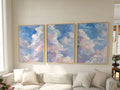 Pastel cloud triptych wall art set of 3 with dreamy blue sky and soft white clouds