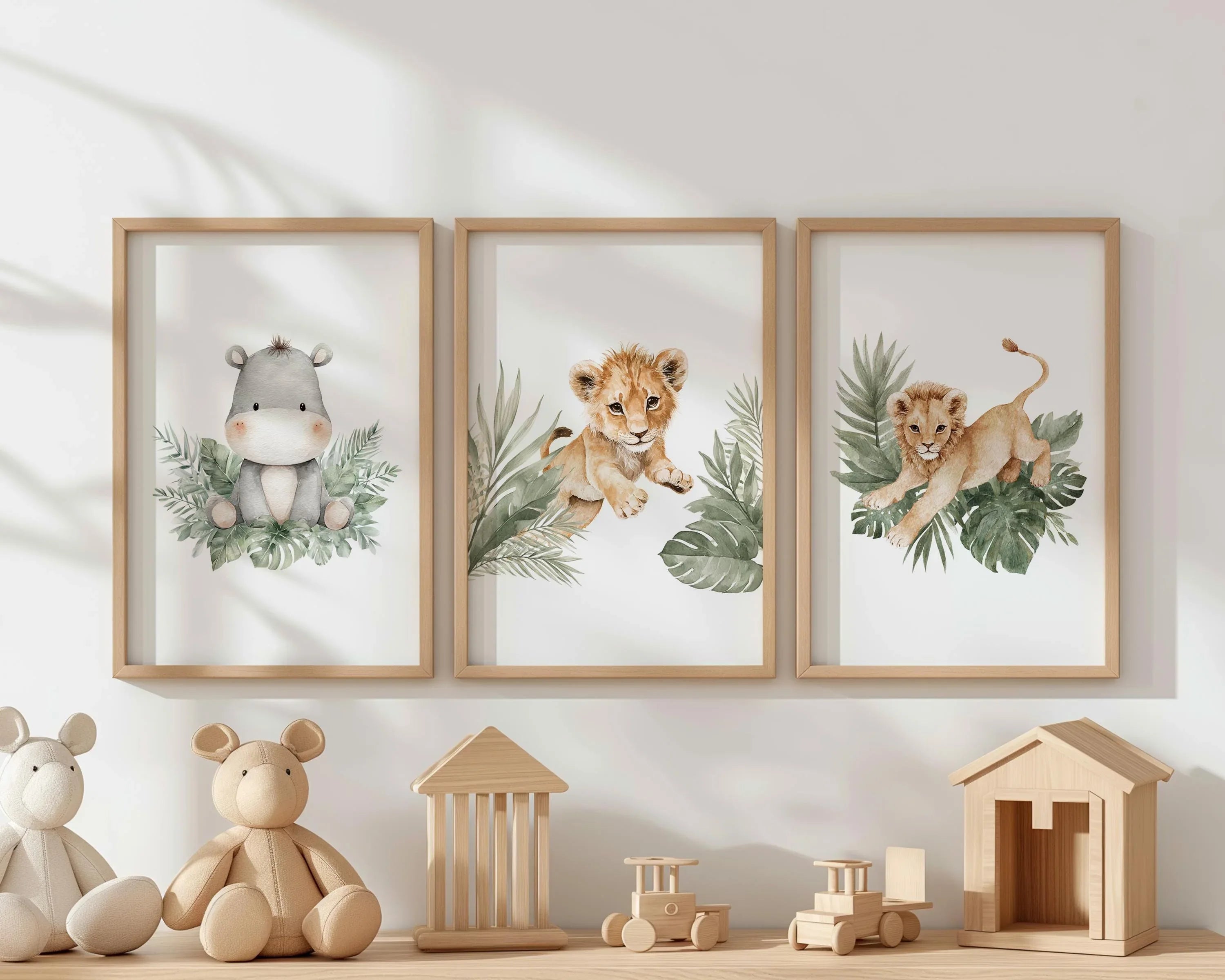 Safari nursery wall art set of 3 – watercolor lion cub and hippo with tropical leaves
