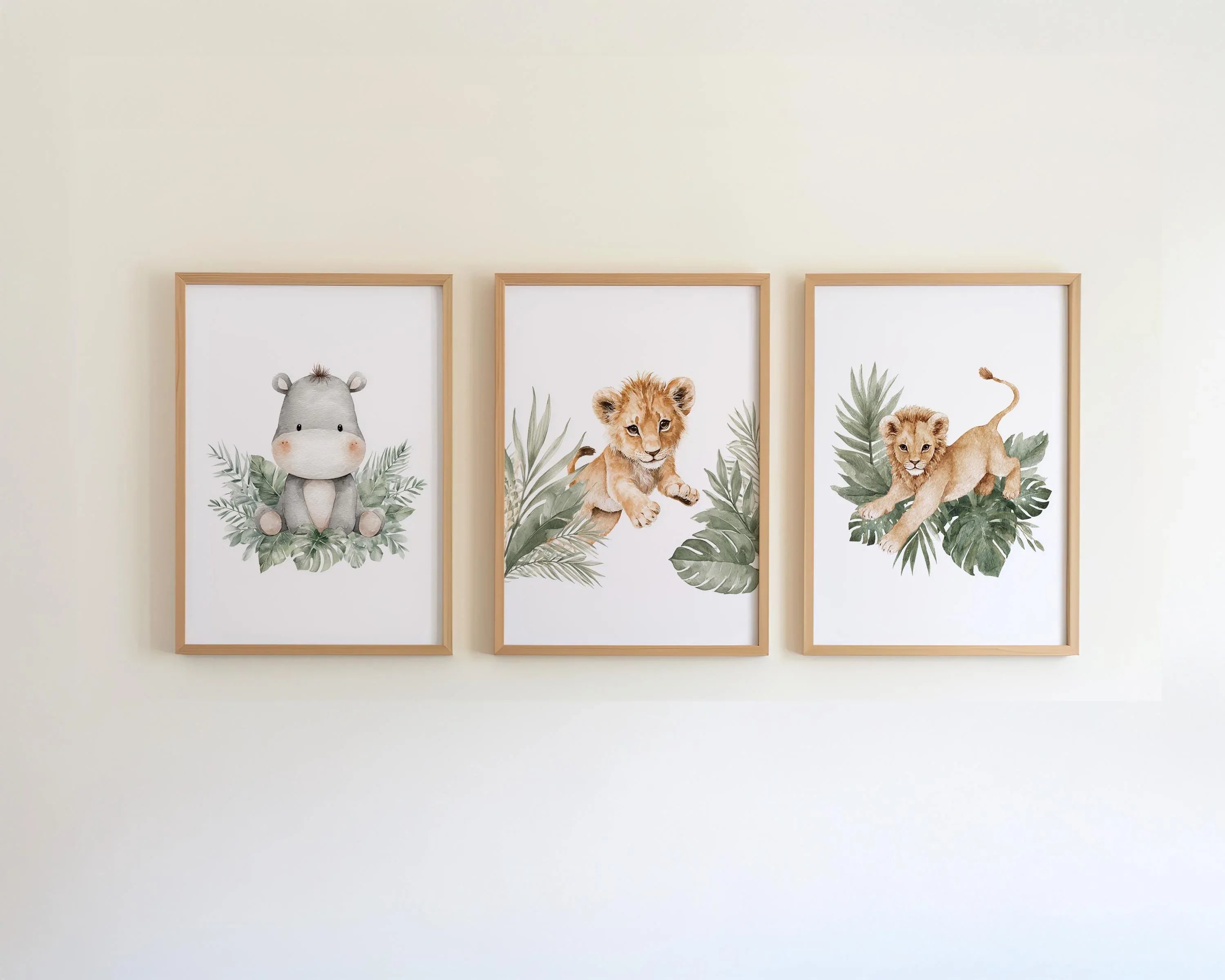 Safari nursery wall art set of 3 – watercolor lion cub and hippo with tropical leaves