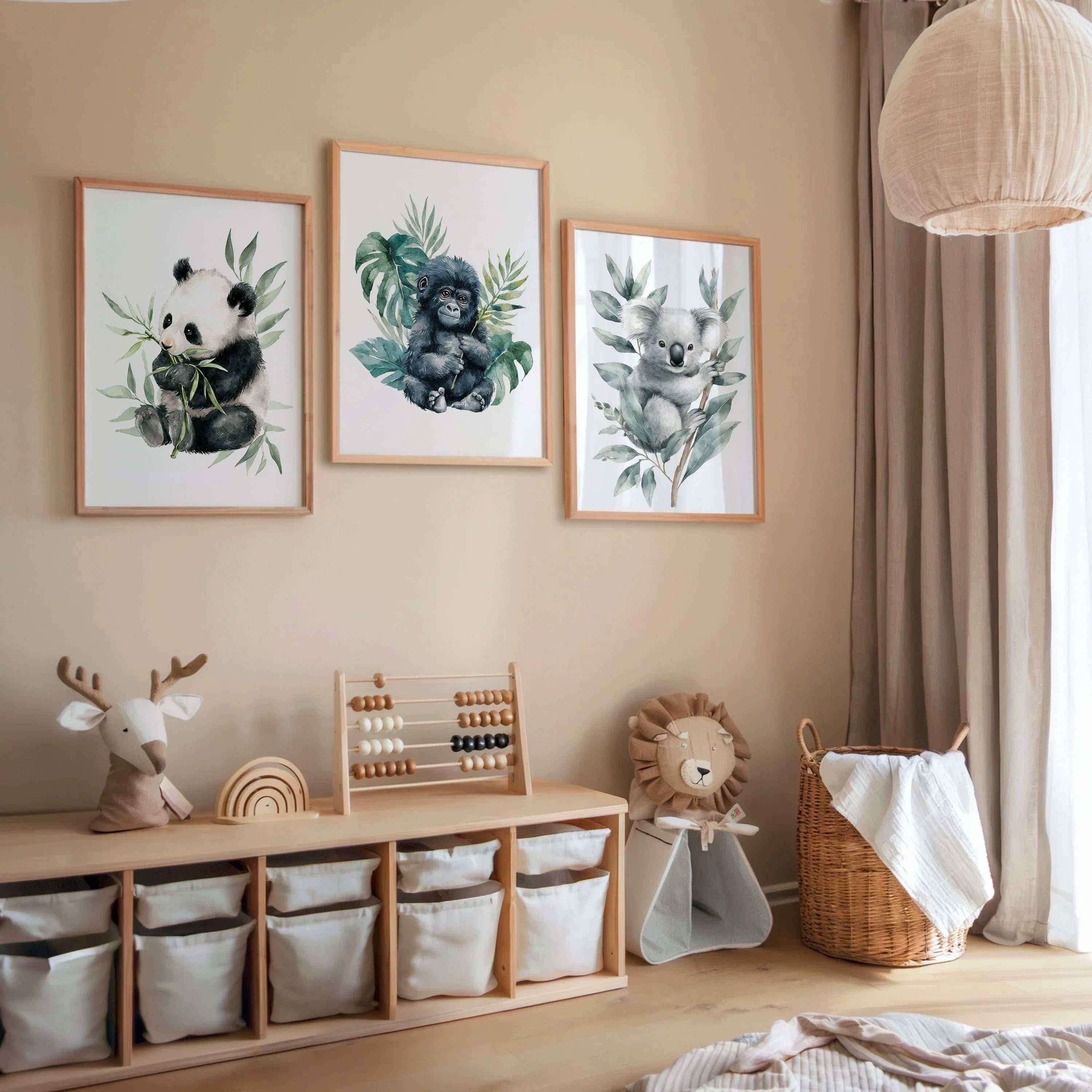 Nursery wall art set of 3 – watercolor panda, gorilla, and koala portraits with soft jungle foliage