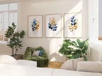 Gold and navy blue botanical watercolor wall art – elegant golden foliage on deep blue background