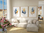 Gold and navy blue botanical watercolor wall art – elegant golden foliage on deep blue background