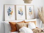 Gold and navy blue botanical watercolor wall art – elegant golden foliage on deep blue background