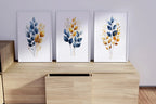 Gold and navy blue botanical watercolor wall art – elegant golden foliage on deep blue background