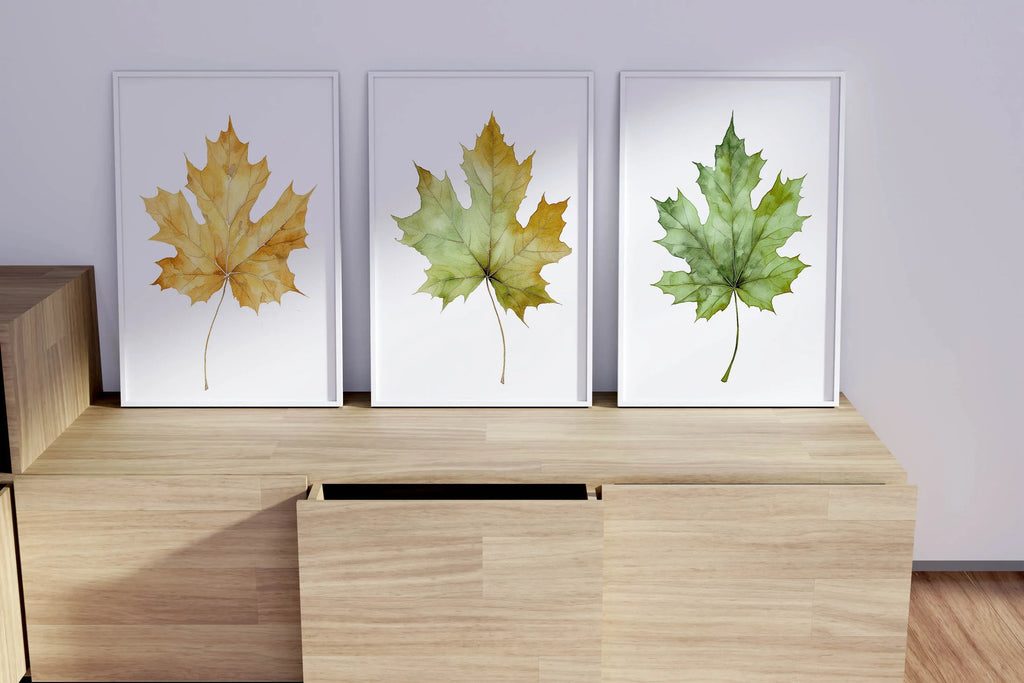Maple leaf watercolor wall art set of 3 – autumn leaves in warm red, orange, and gold tones