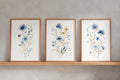 Meadow wildflowers watercolor wall art set of 3 – gold and navy blue botanical triptych
